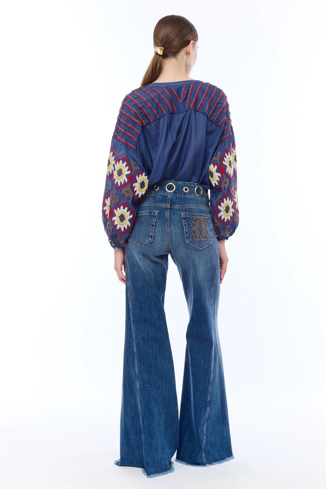 Jeans Nenette a zampa con occhielli donna