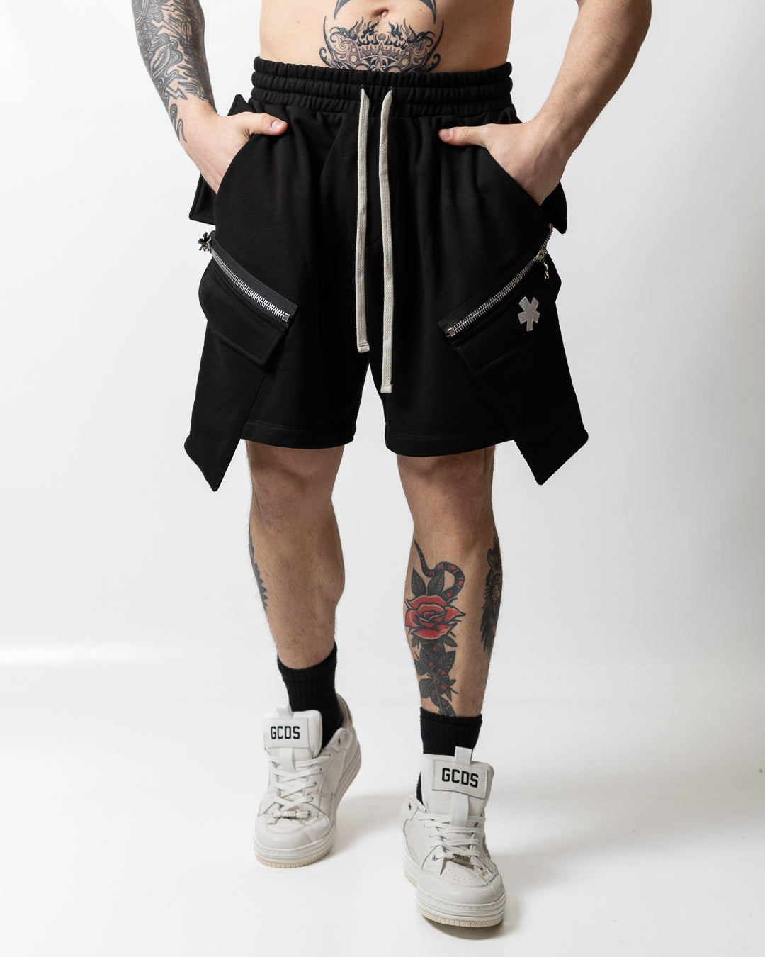 Bermuda Comme des Fuckdown cargo in felpa con zip uomo