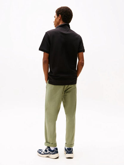 Polo Tommy Jeans con banda logata uomo