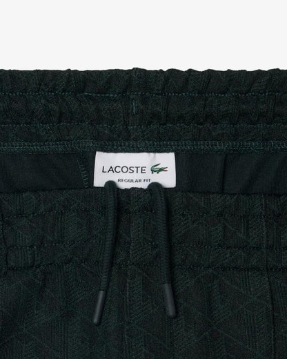 Pantalone Lacoste logato allover uomo