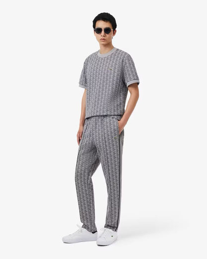 Pantalone Lacoste logato allover uomo