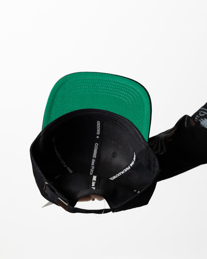 Cappello Comme des Fuckdown con visiera e ricamo