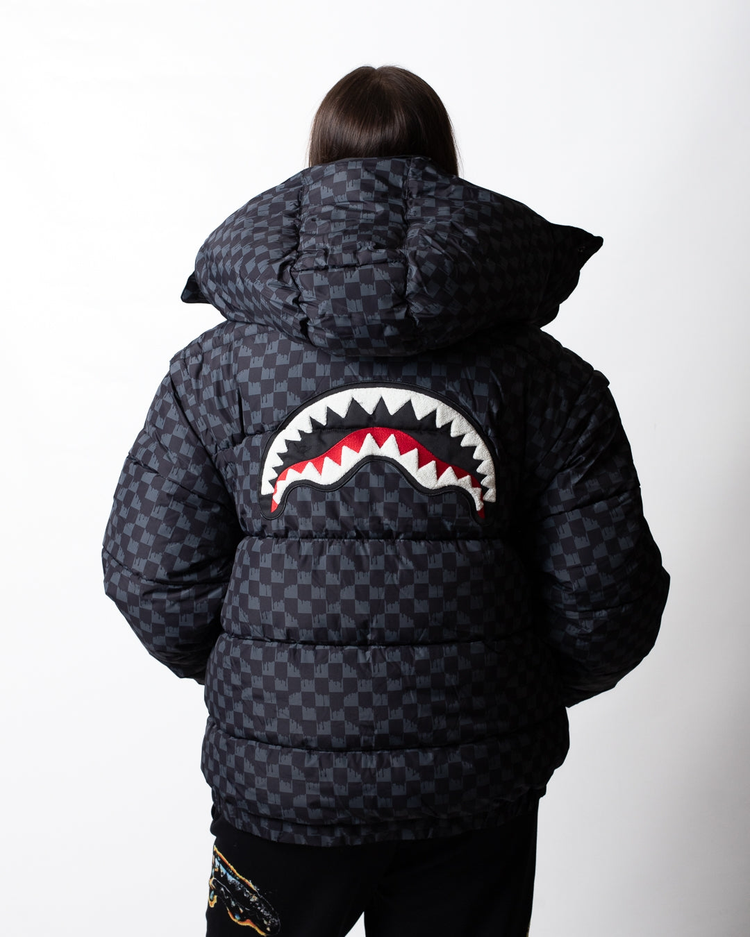 Giubbotto Sprayground puffer con cappuccio e maniche staccabili