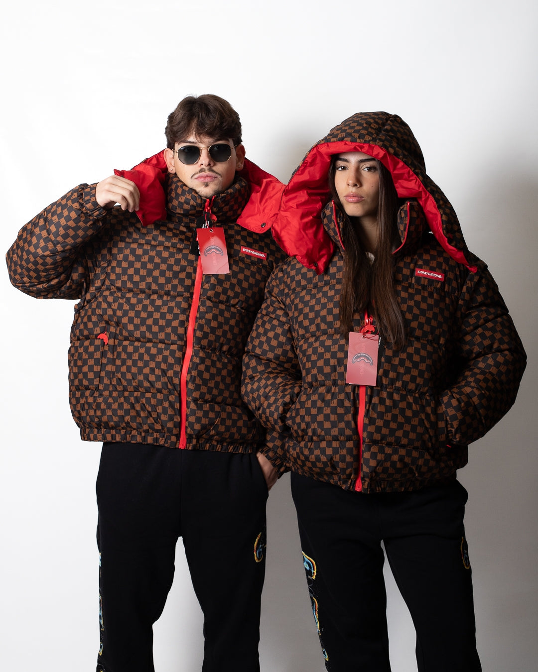 Giubbotto Sprayground puffer con cappuccio e maniche staccabili