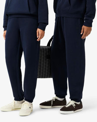 Pantalone Lacoste in felpa con logo tono su tono uomo