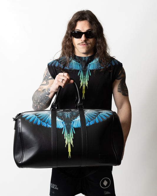Borsone Marcelo Burlon in ecopelle "Icon Wings Royal" logato