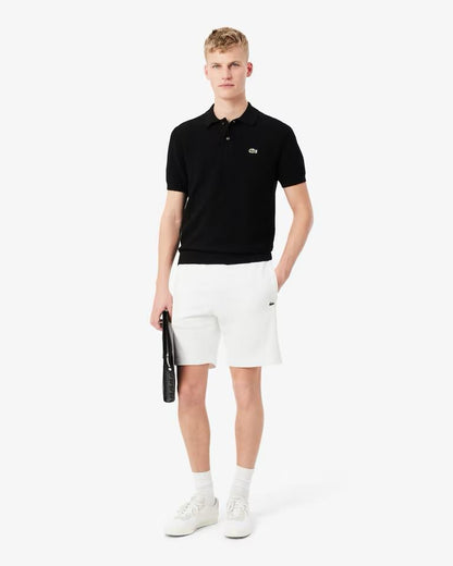 Bermuda Lacoste in felpa con fasce logate uomo