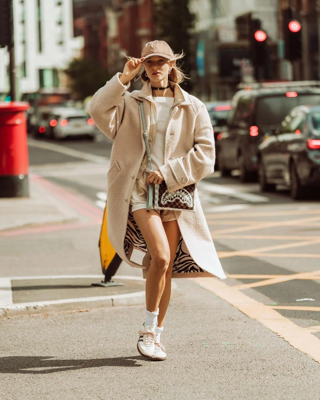 Pochette Sprayground marrone "CREAM AND BROWN TEAR CHECK CROSSOVER CLUTCH"