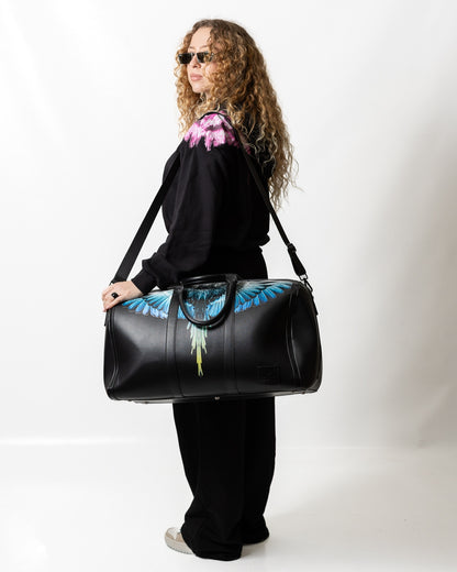 Borsone Marcelo Burlon in ecopelle "Icon Wings Royal" logato