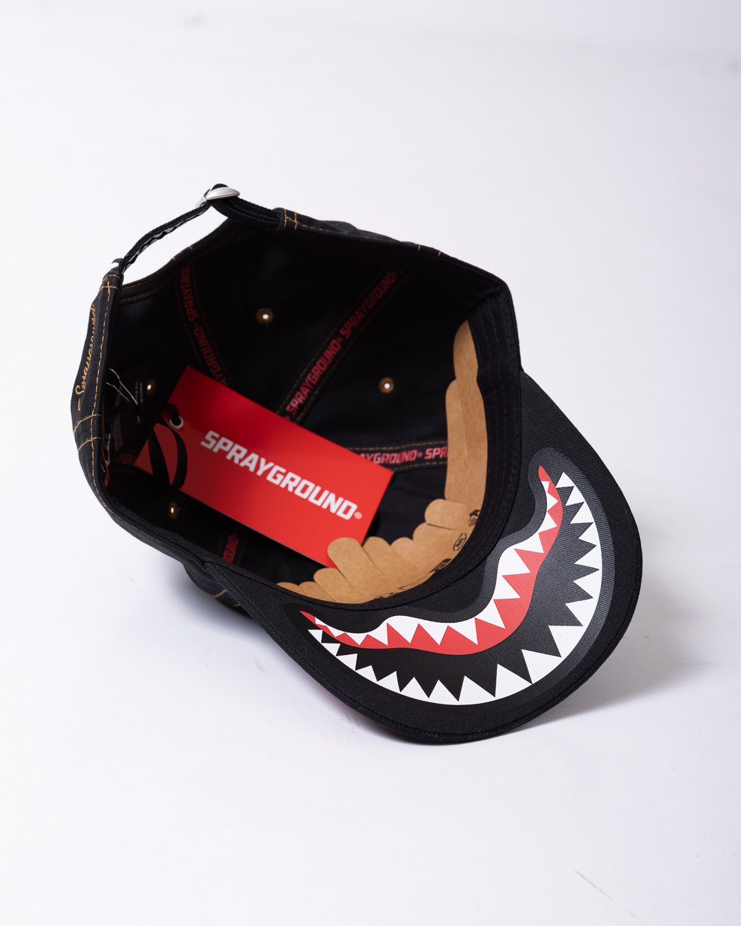 Cappello Sprayground con visiera, logo ricamato a contrasto e logo stampato