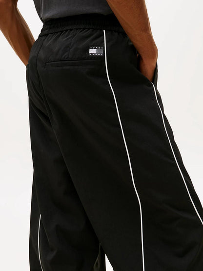 Pantalone Tommy Jeans in nylon "Parachute Track" uomo