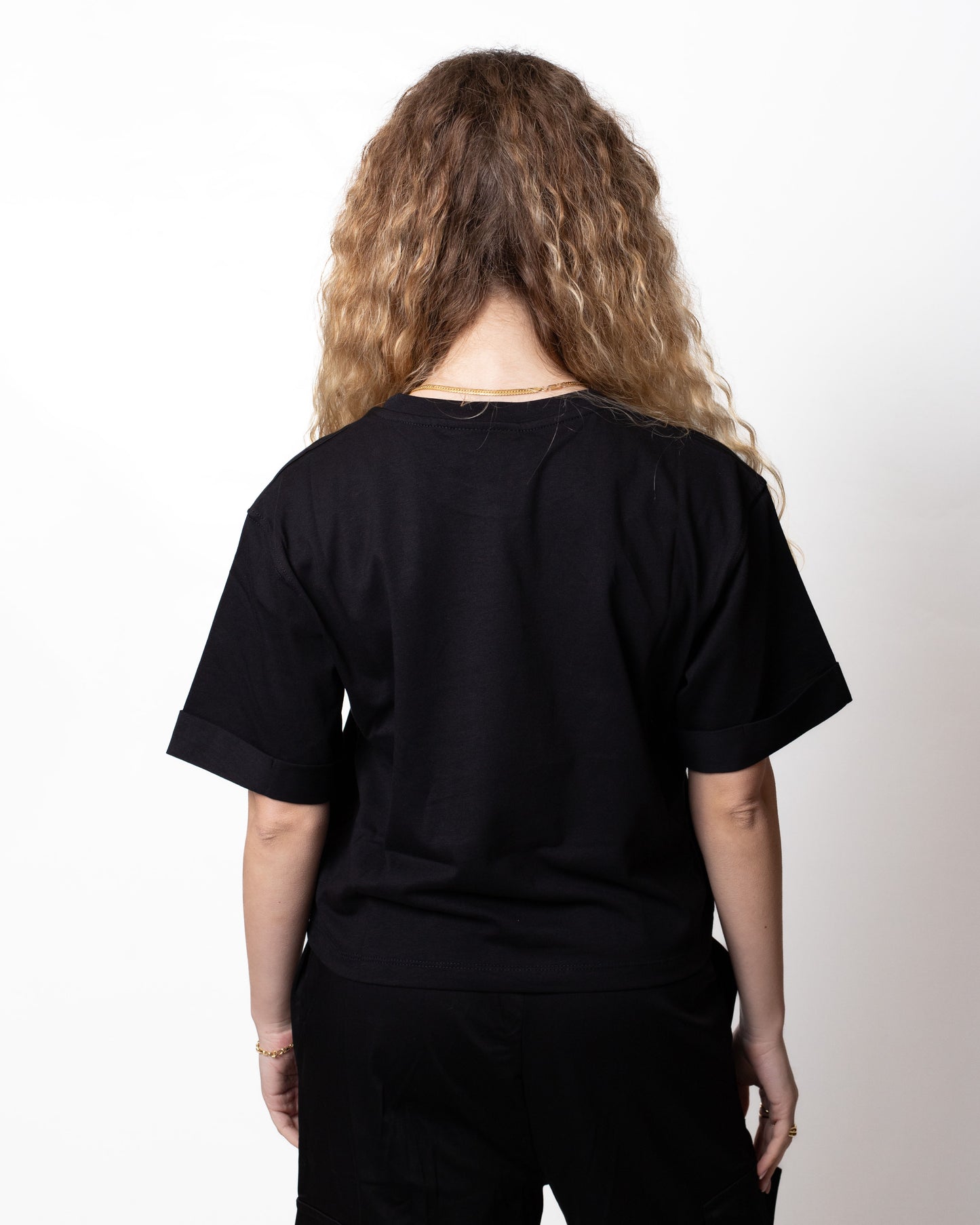 T-Shirt Disclaimer cropped con stampa a glitter donna