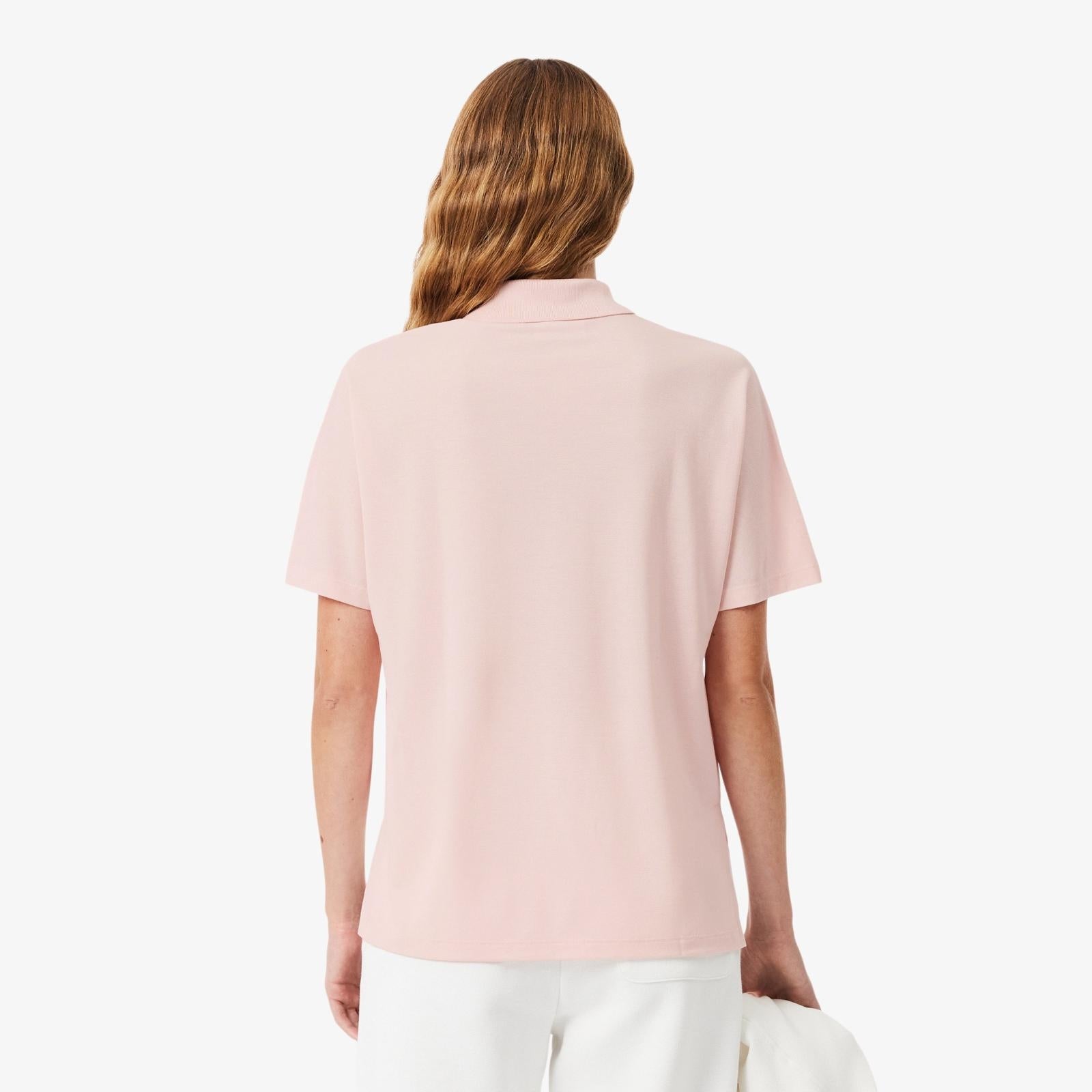 Polo Lacoste in fluido pique donna