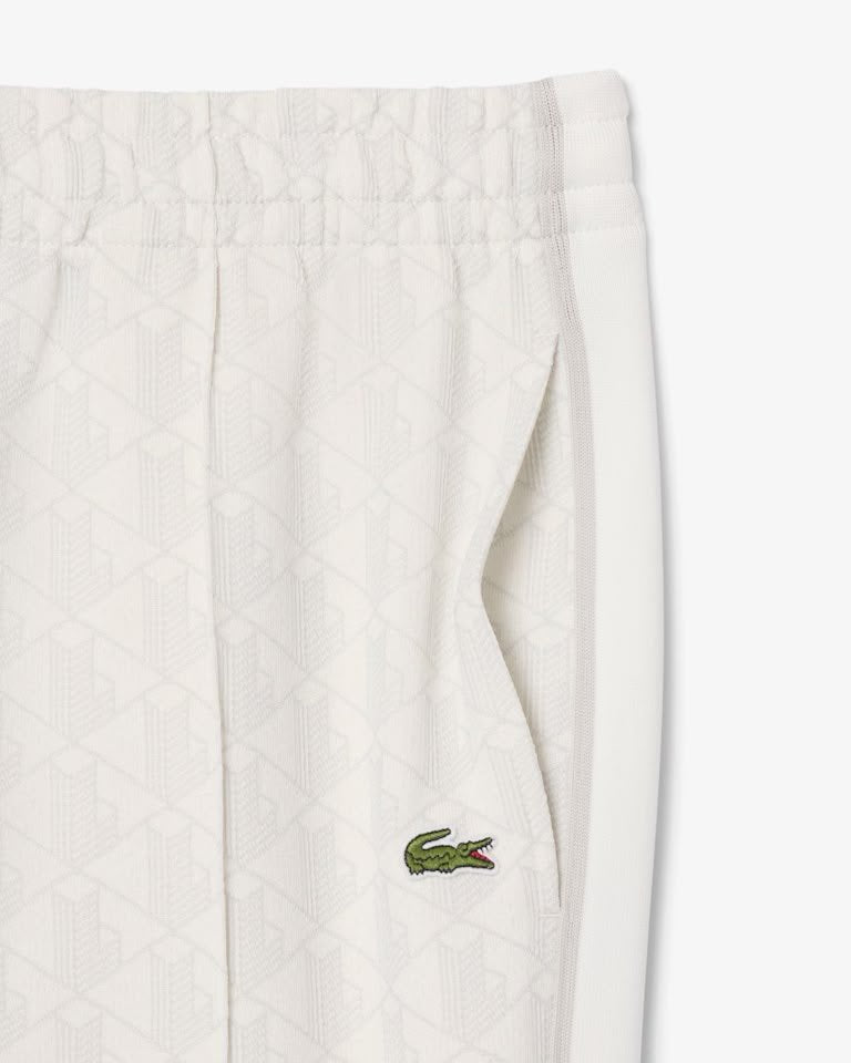 Pantalone Lacoste logato allover uomo