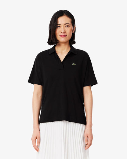 Polo Lacoste in fluido pique donna