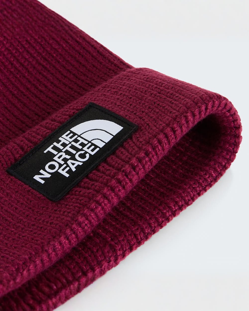 Cappello The North Face logo patch e pompon