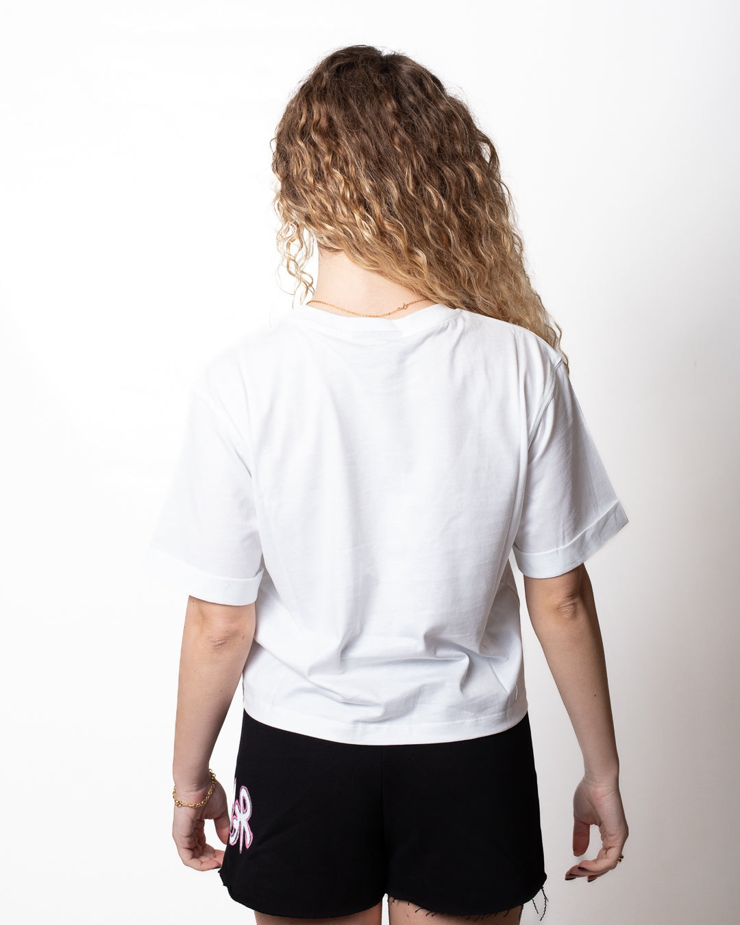 T-Shirt Disclaimer cropped con stampa a glitter donna