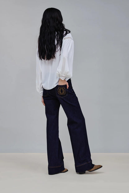 Pantalone Nenette flare con dettagli oro
