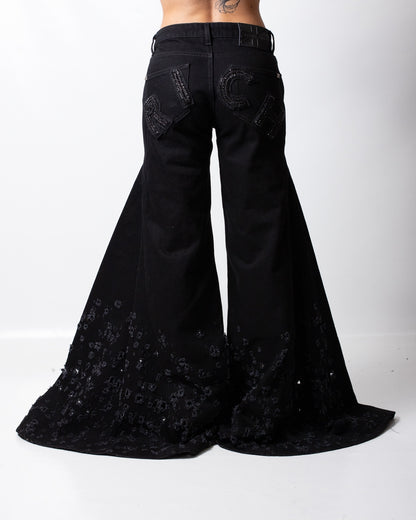 Jeans John Richmond a gamba larga con strappi e logo patch donna