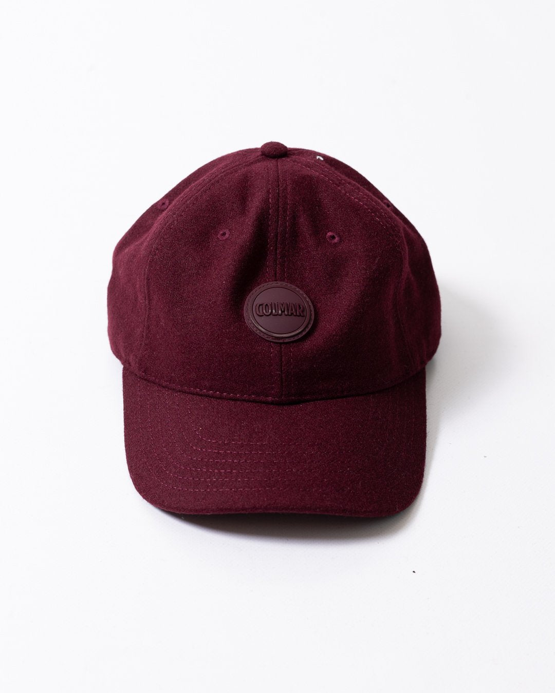 Cappello Colmar in lana con visiera e logo in rilievo