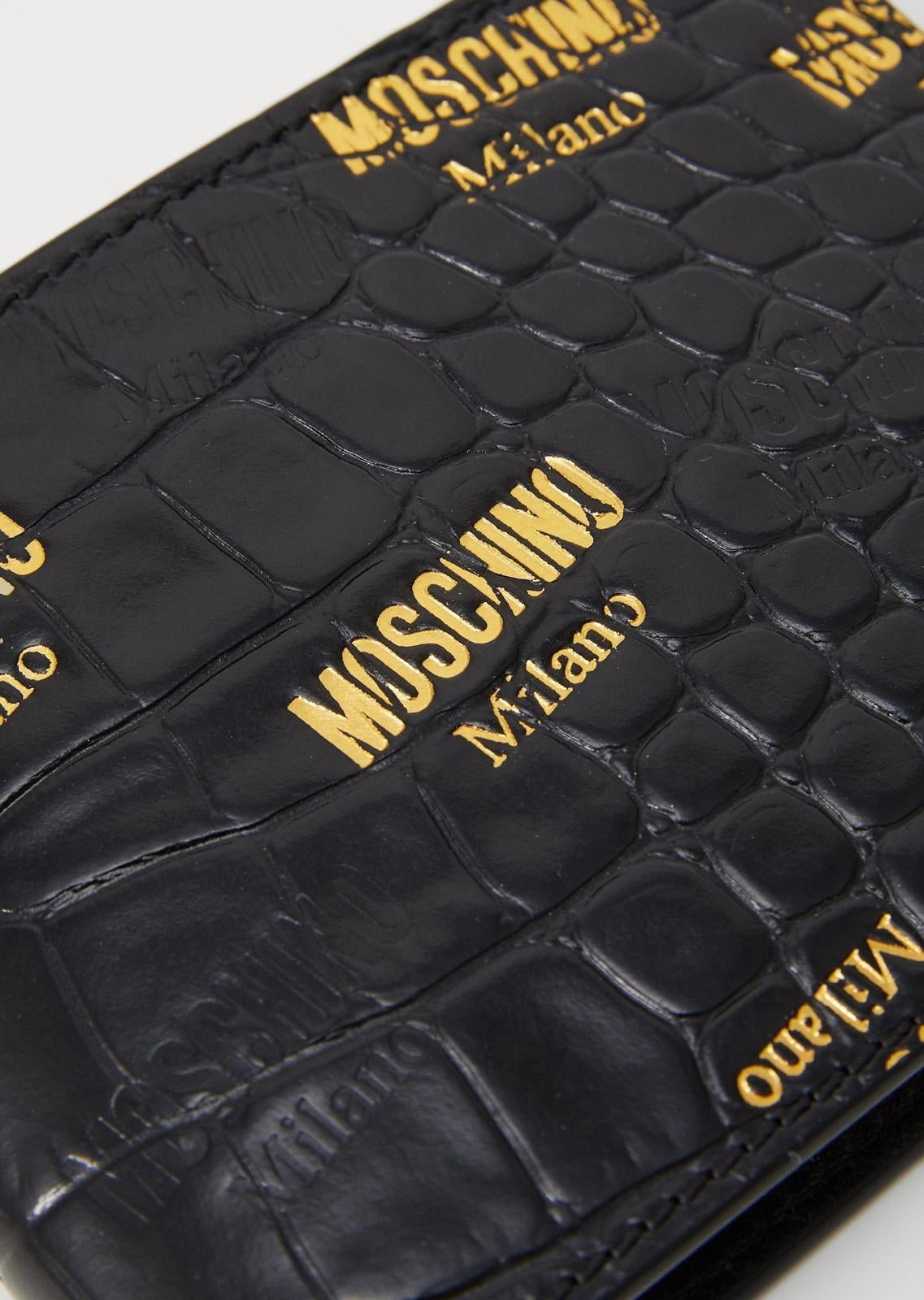 Portafoglio Moschino in coccodrillo con logo all-over