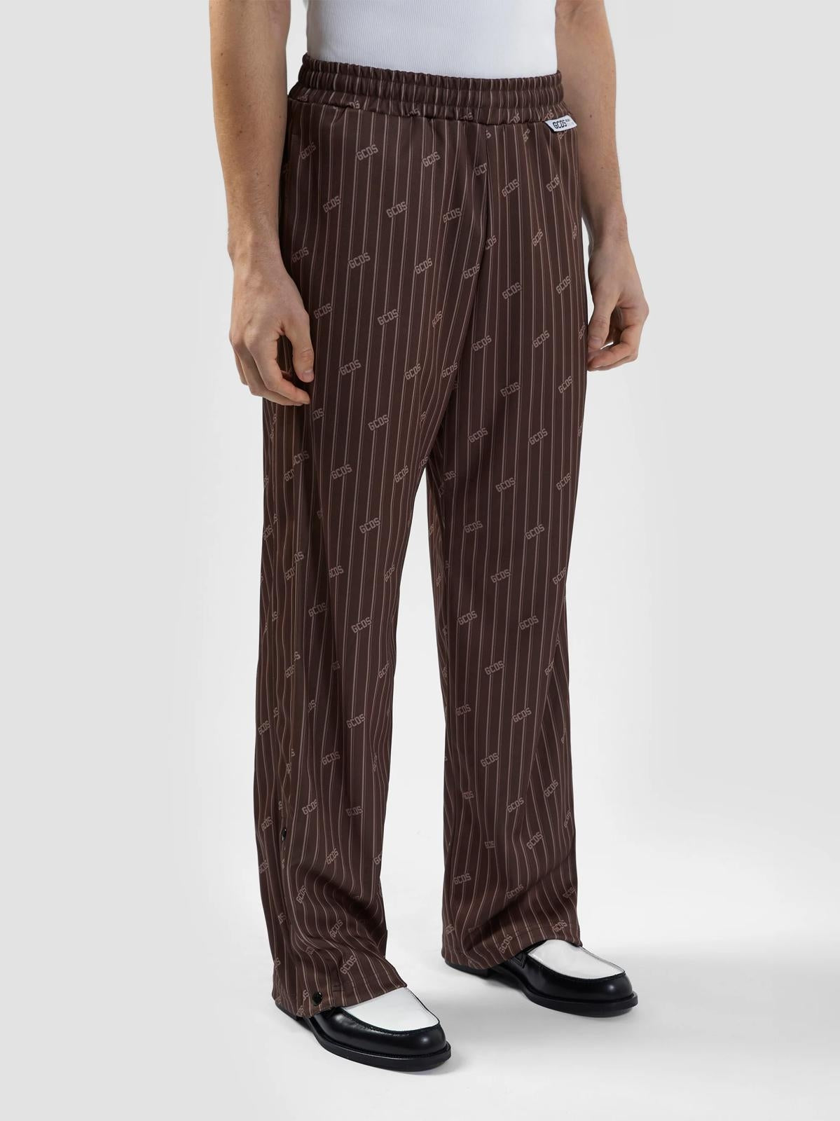 Pantalone GCDS in acetato con logo all-over uomo