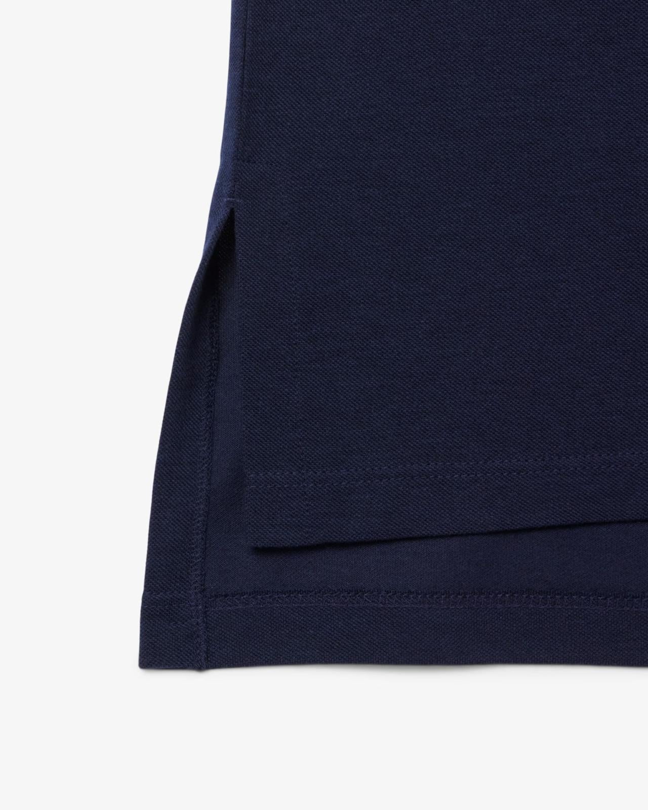 Polo Lacoste in fluido pique donna