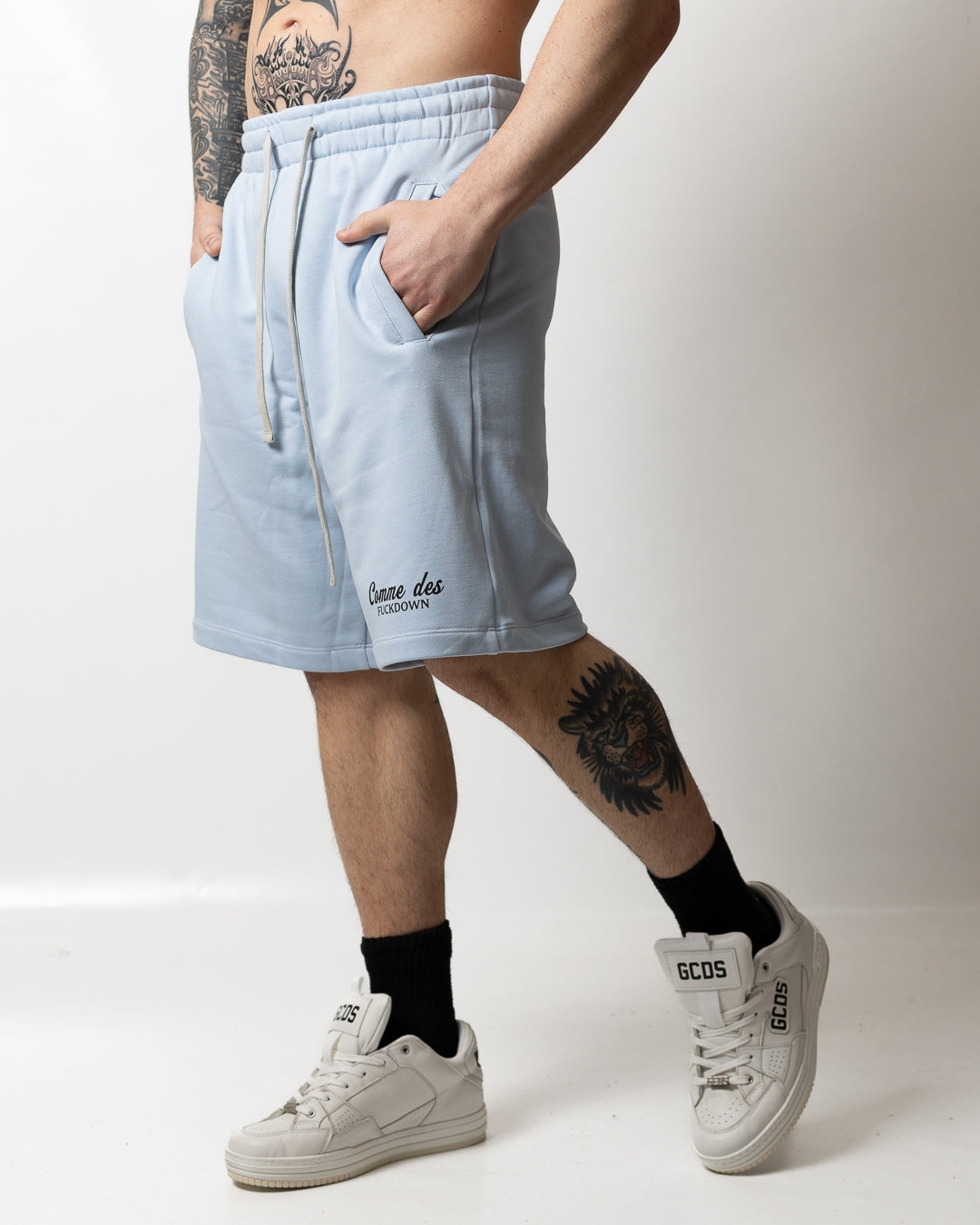 Bermuda Comme des Fuckdown in felpa con stampe uomo