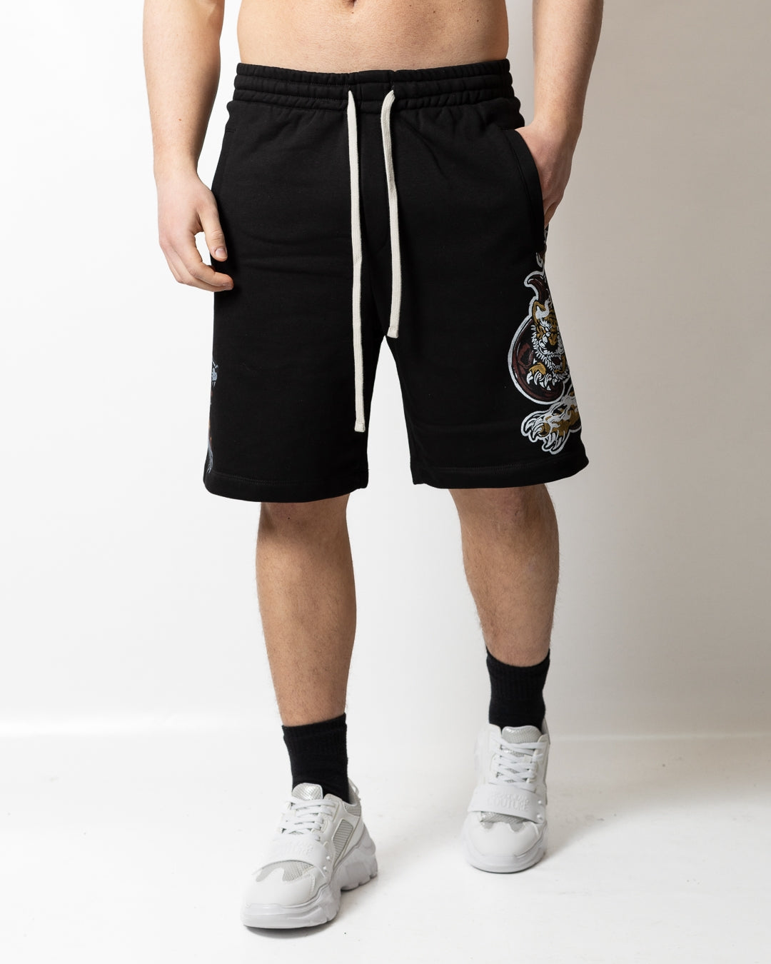 Bermuda Comme des Fuckdown in felpa con stampe uomo