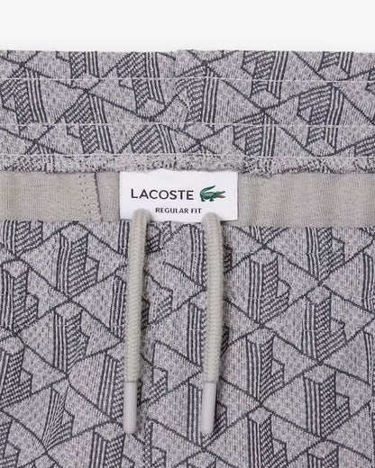 Pantalone Lacoste logato allover uomo