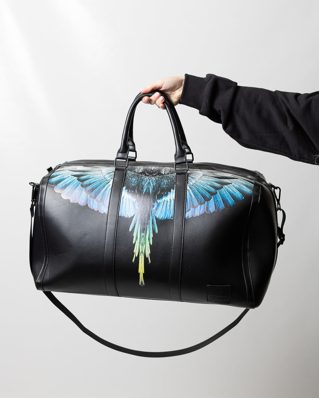 Borsone Marcelo Burlon in ecopelle "Icon Wings Royal" logato