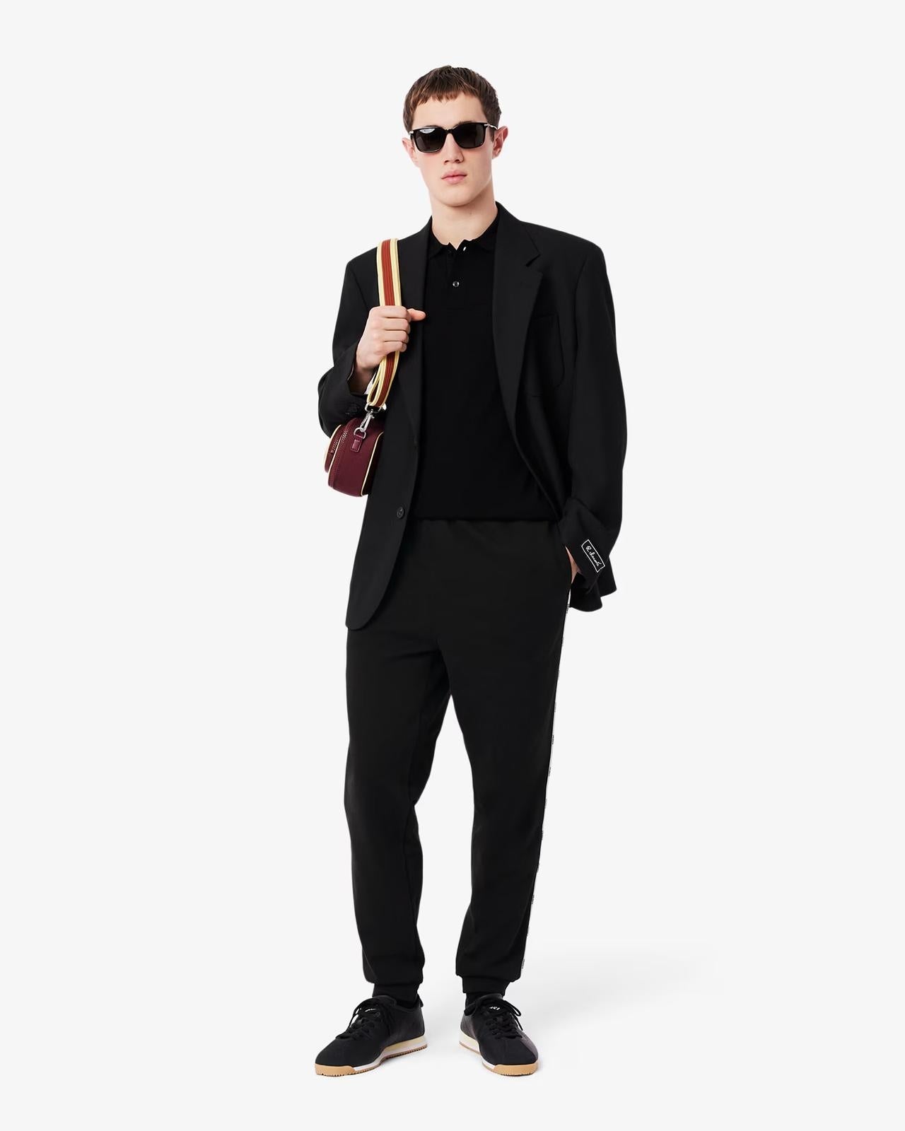 Pantalone Lacoste con logo firmato lungo la gamba uomo