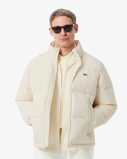Giubbotto Lacoste con cappuccio impermeabile e iconico logo