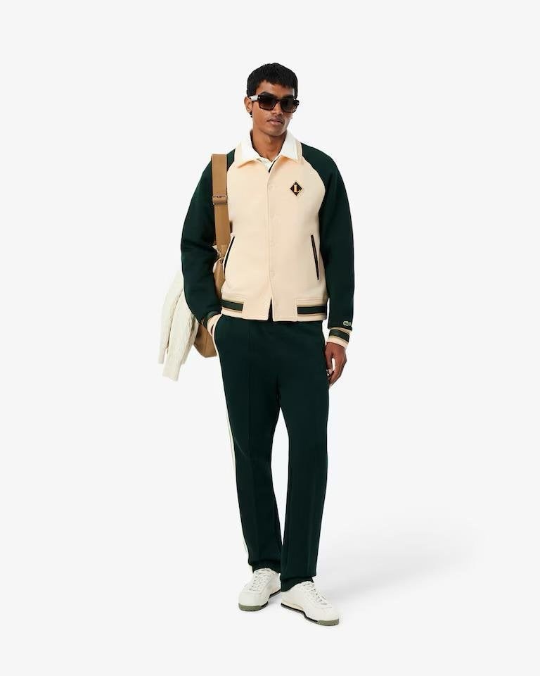 Felpa polo Lacoste con patch logo e color block