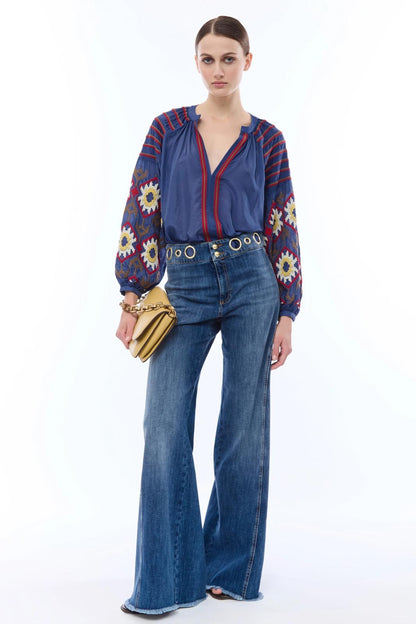 Jeans Nenette a zampa con occhielli donna