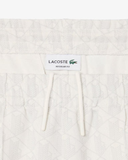 Pantalone Lacoste logato allover uomo