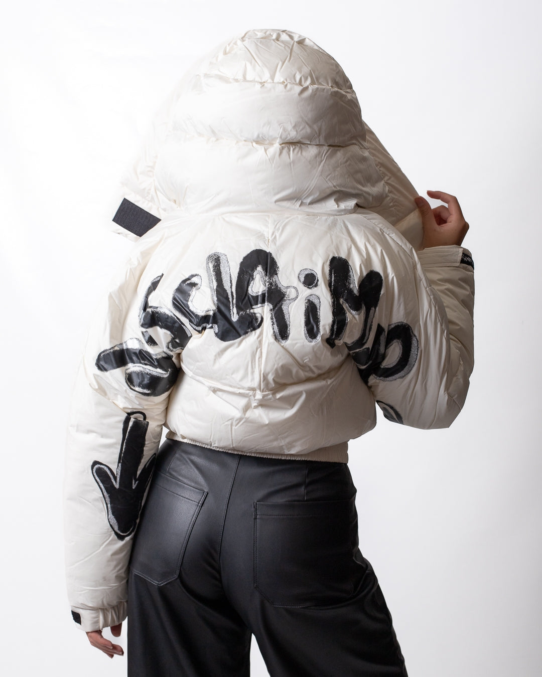 Piumino Disclaimer puffer con dettagli maculati donna