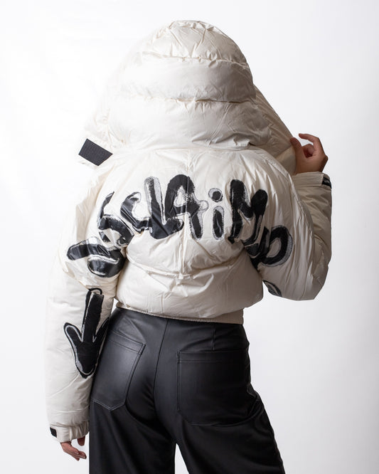 Piumino Disclaimer puffer con dettagli maculati donna