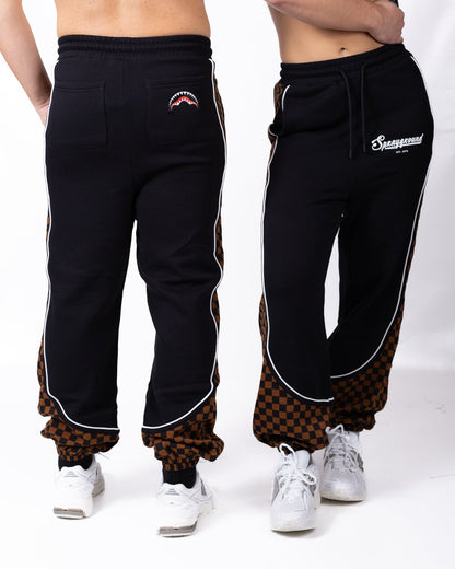 Pantalone Sprayground "brown check" con logo stampato e patch decorativa