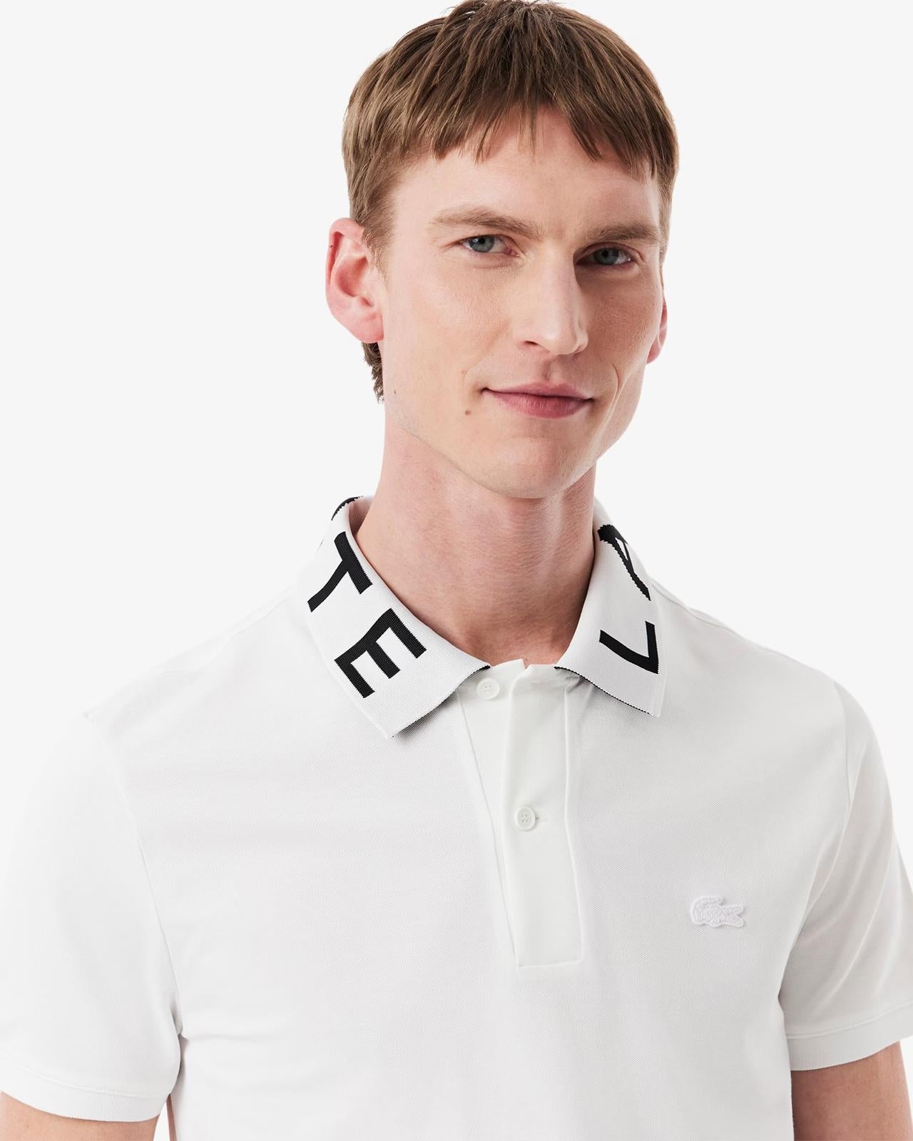 Polo Lacoste con logo sul colletto a contrasto jacquard
