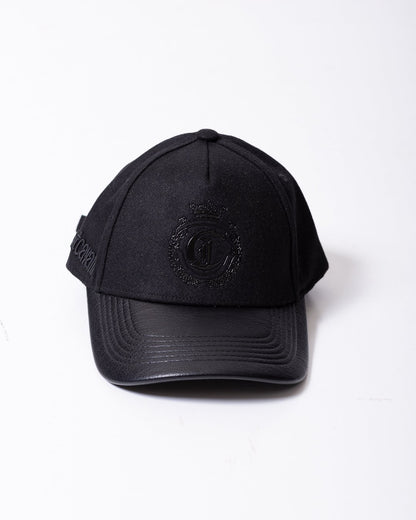 Cappello Just Cavalli in lana ed ecopelle con visiera e logo in rilievo