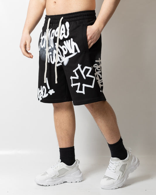 Bermuda Comme des Fuckdown in felpa con stampa spray uomo