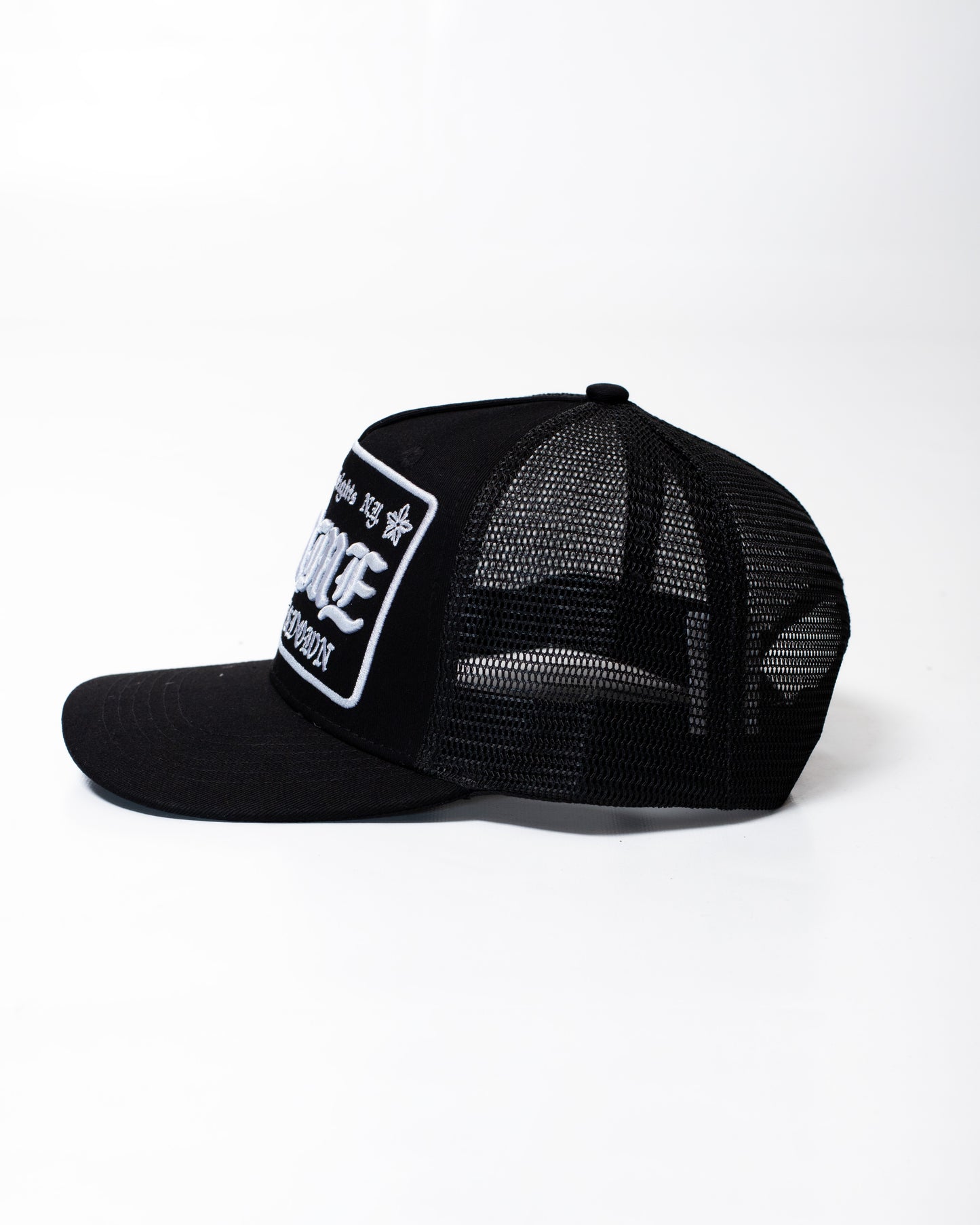Cappello Comme des Fuckdown in rete con ricamo