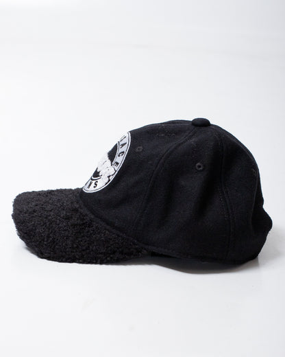 Cappello Versace Jeans Couture con visiera teddy