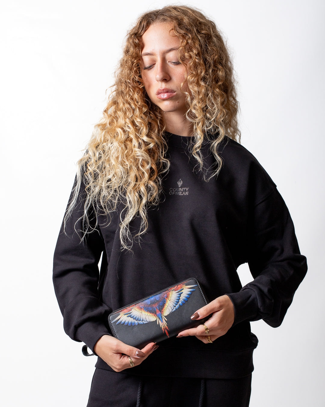 Portafoglio Marcelo Burlon in ecopelle con zip e logo wings