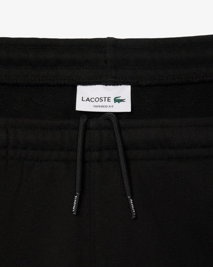 Pantalone Lacoste con logo firmato lungo la gamba uomo