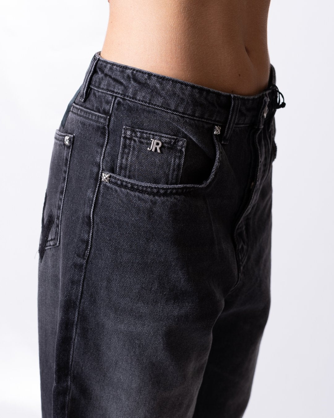 Jeans John Richmond con logo patch "Rich" in velluto