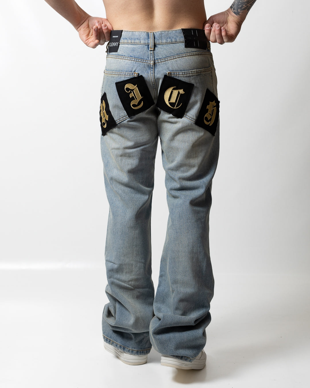 Jeans John Richmond a zampa con logo patch uomo