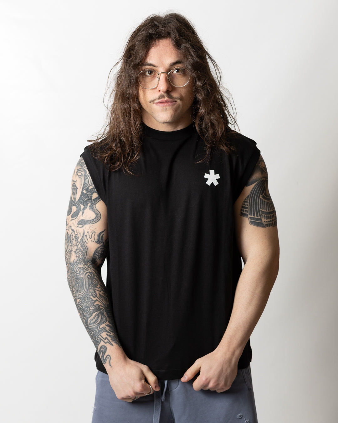 T-Shirt Comme des Fuckdown smanicata con logo uomo