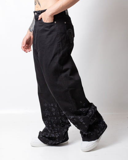 Jeans John Richmond baggy con tagli e logo patch uomo